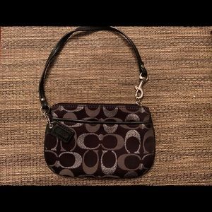 Black Coach fabric wristlet.